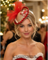 Peppermint Gingerbread Holiday Fascinator with red tulle bow, gingerbread-inspired base, peppermint candy accents, and festive Christmas styling.