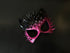 Pink and black spiked masquerade mask with cat ears and ombré finish, designed for bold Halloween or rave costumes.