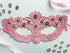 Pink lace masquerade mask with blush crystal rhinestones for moon ball and gala evening events.