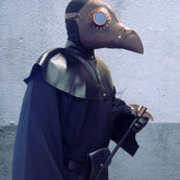 Full masquerade outfit with plague doctor mask, goggles, and black cape.