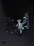 Purple and black spiderweb masquerade mask with gothic openwork filigree, rhinestone accents, purple web edges, and ribbon ties for costume events.