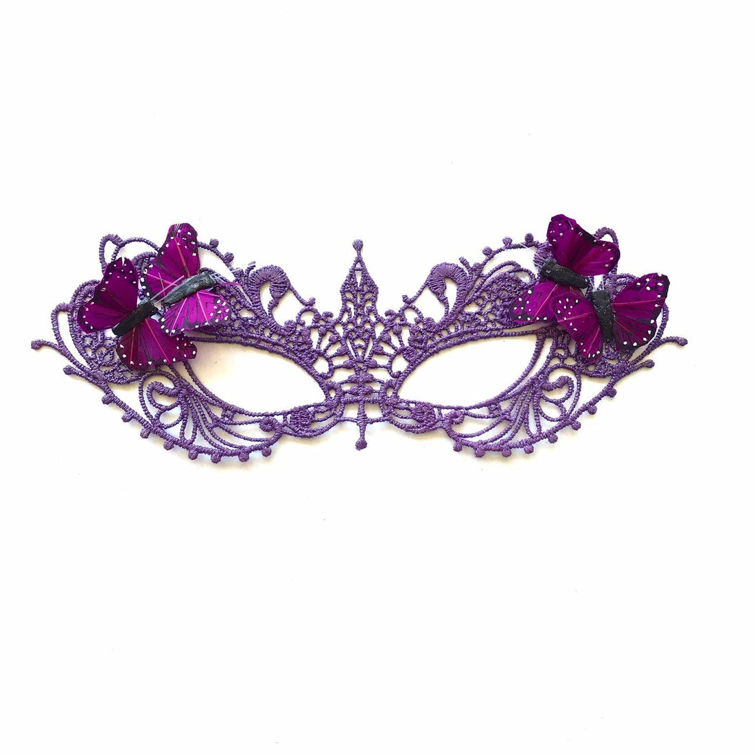 Laser-cut purple masquerade mask with two glittery butterflies for whimsical and fun costume looks