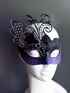 Purple and black butterfly masquerade mask with rhinestone wing design.