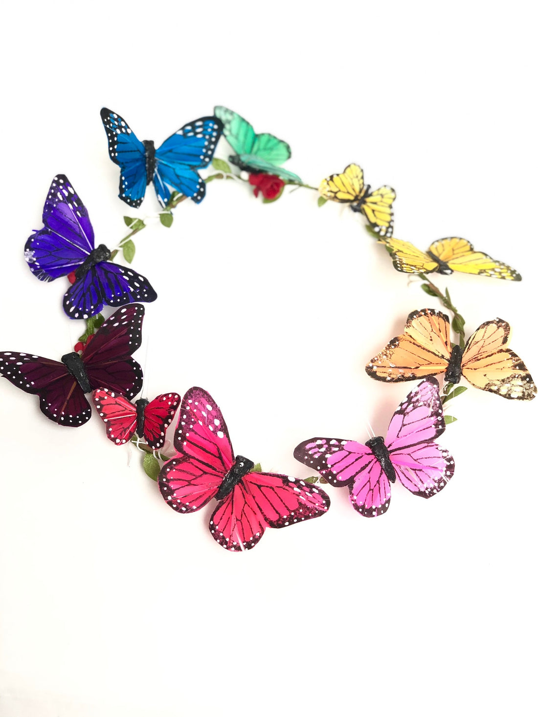 Colorful monarch butterfly headband arranged in a circle for whimsical hair styling