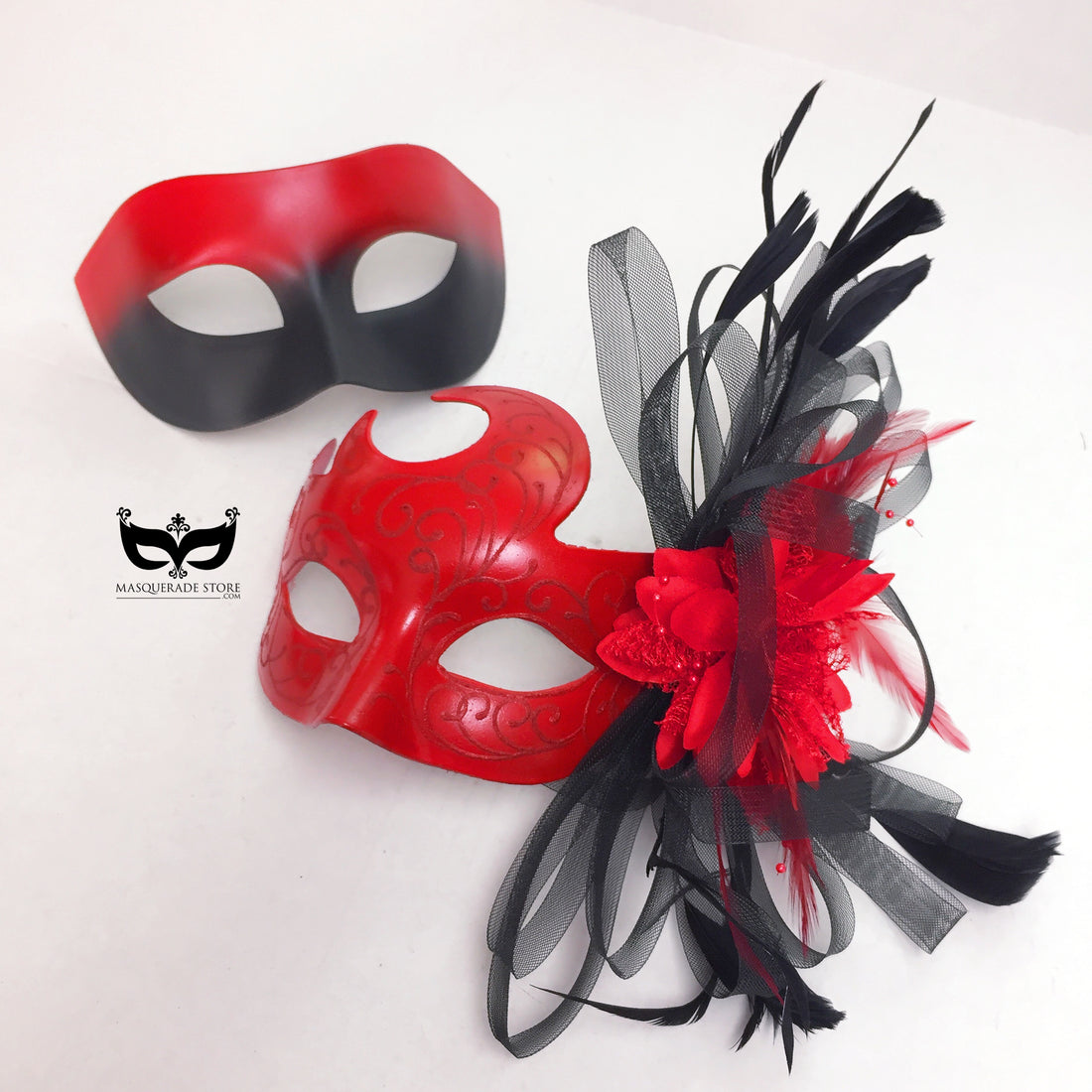 Red and black couples masquerade mask set with feather and floral accents, elegant his and hers costume party masks.
