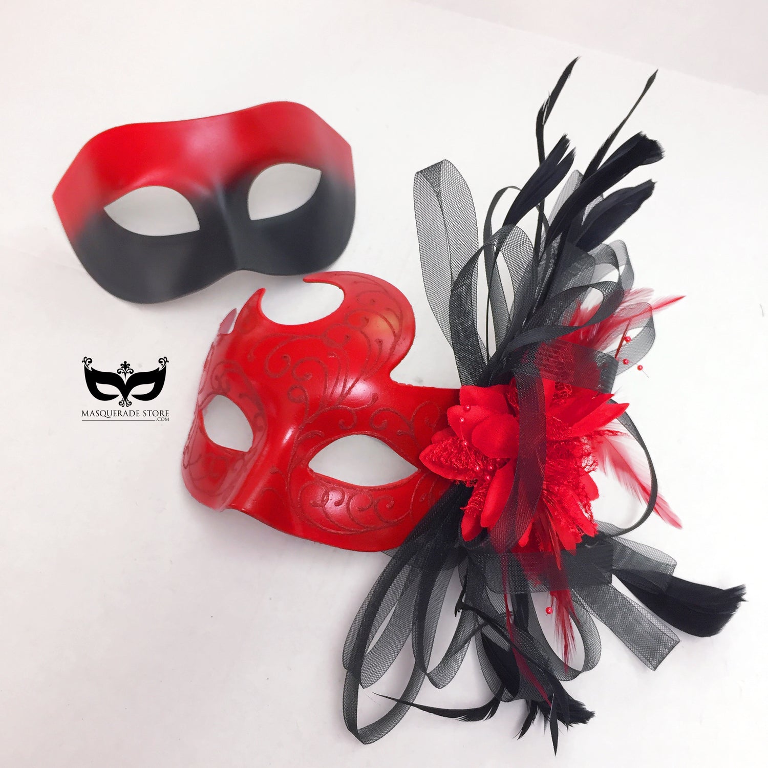 Red and black couples masquerade mask set with feather and floral accents, elegant his and hers costume party masks.