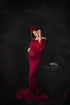 Deep red floral maternity crown styled for a photoshoot with matching dress