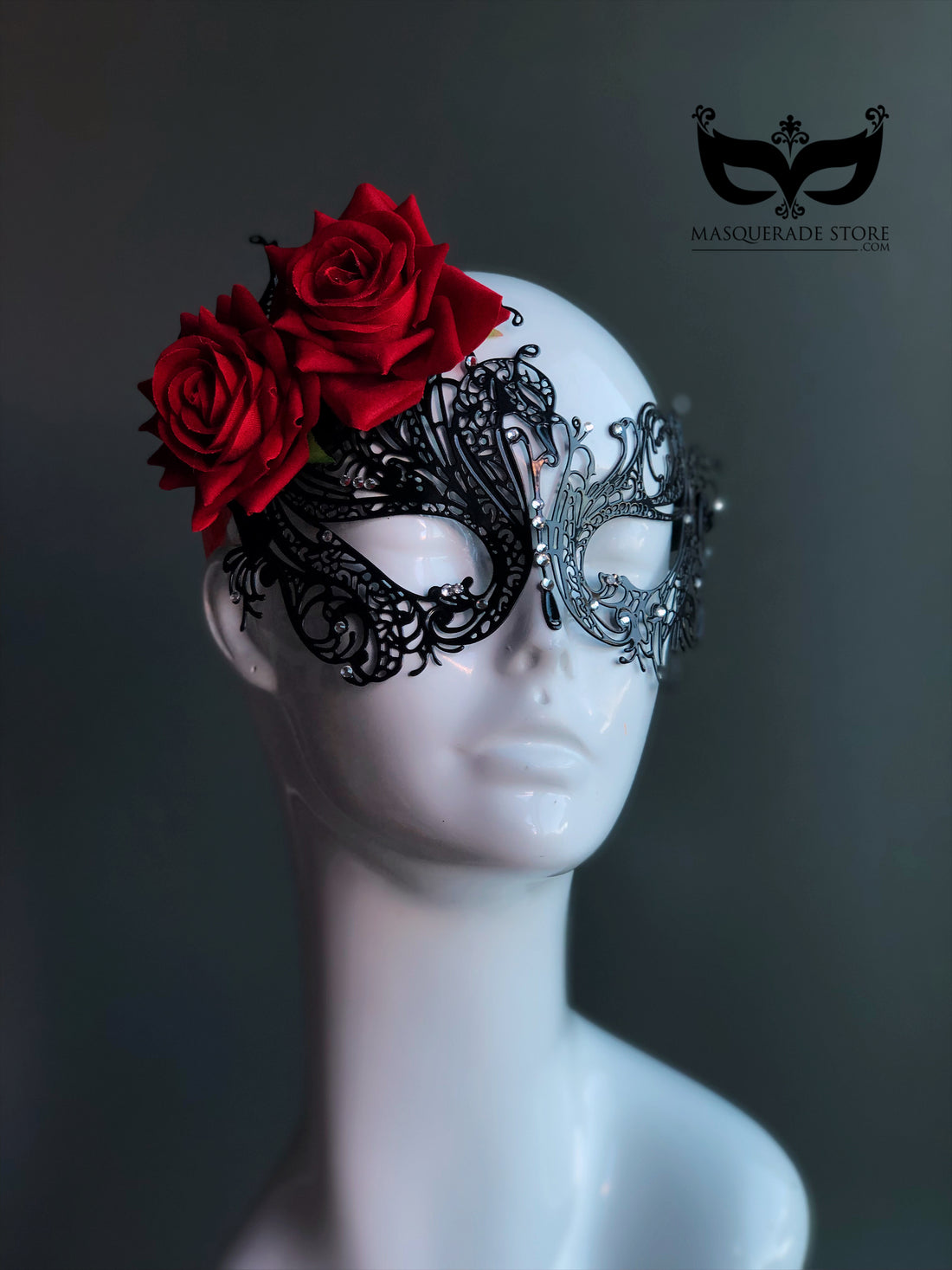 Black filigree masquerade mask with red roses and rhinestone accents for women, ideal for parties and masquerade balls.