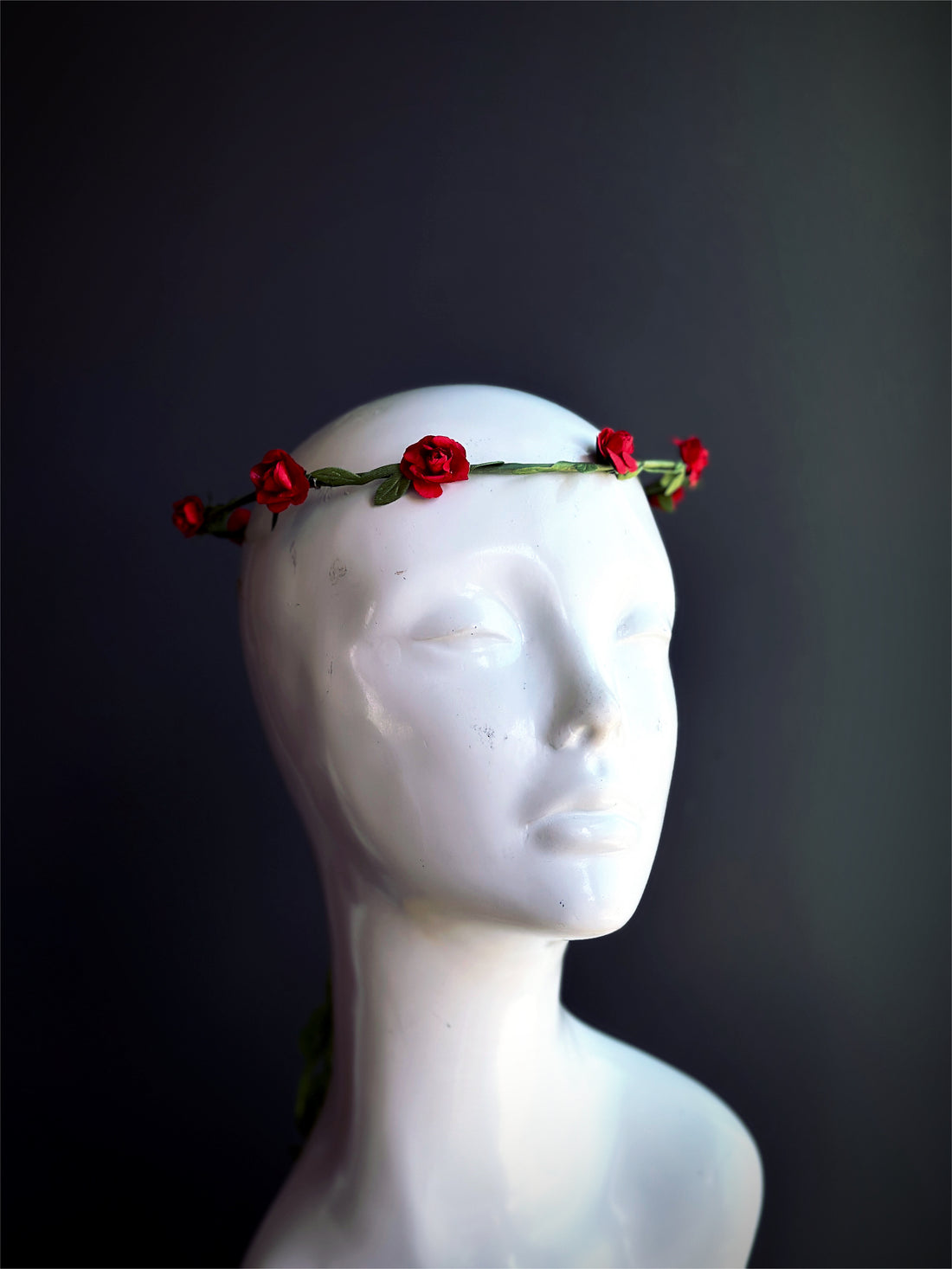 Red rose flower crown headpiece with green stems for weddings, boho festivals, and renaissance costumes.