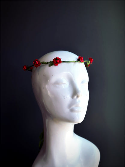 Red rose flower crown headpiece with green stems for weddings, boho festivals, and renaissance costumes.