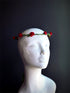 Red rose flower crown headpiece with green stems for weddings, boho festivals, and renaissance costumes.