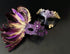 Purple feather masquerade mask set with ornate resin half mask for formal costume occasions.