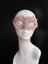 Rose gold and pink lace masquerade mask with rhinestones for party and wedding events.