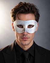 Silver Glacier Masquerade Mask with shimmering metallic silver finish, embossed geometric texture, and classic Venetian eye openings.