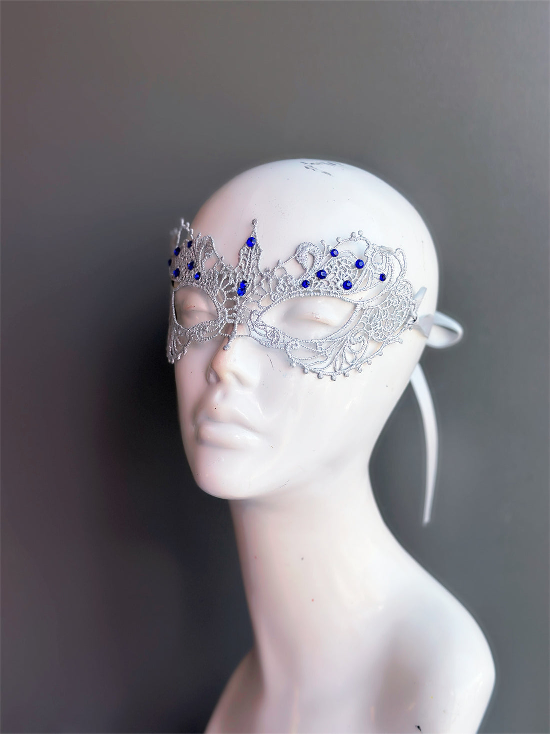 Silver lace masquerade mask with rhinestones, perfect for party wear