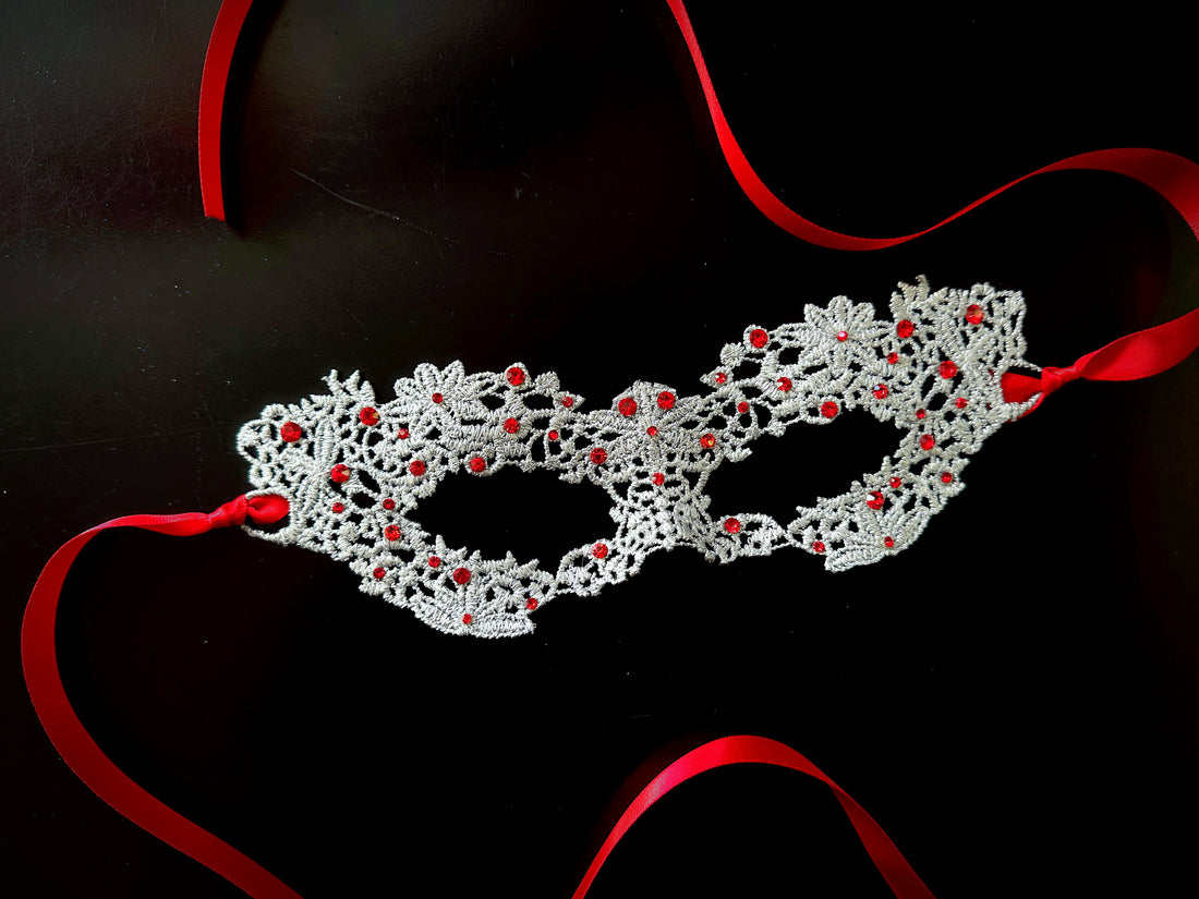 Silver lace masquerade mask with red rhinestones and satin ribbon ties, elegant party mask for women, perfect for prom, Halloween, or masquerade ball.