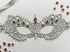 Silver lace masquerade mask with ruby red rhinestones for Venetian gala and formal ballroom events.