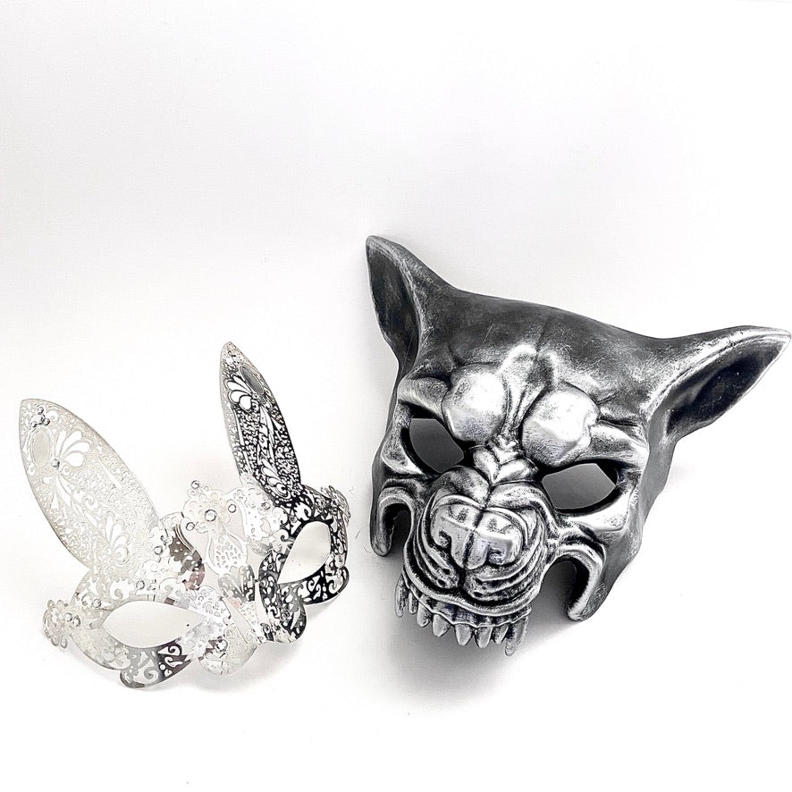 Elegant Silver wolf mask paired with intricate black lace bunny mask for couples, perfect for Venetian masquerade events and themed parties.

