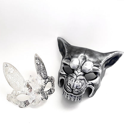 Elegant Silver wolf mask paired with intricate black lace bunny mask for couples, perfect for Venetian masquerade events and themed parties.


