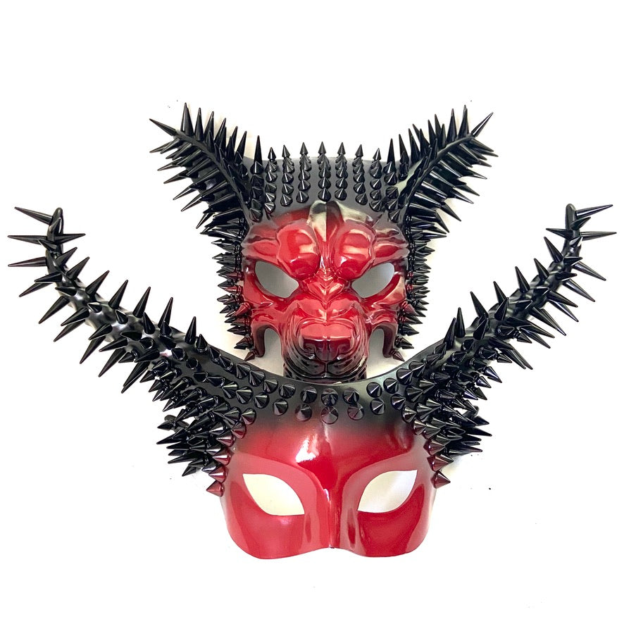 Fierce red and black spiked masquerade masks styled as wolves for couples
