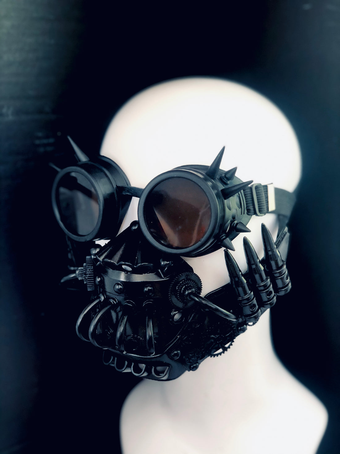 Steampunk respirator mouth guard with spike goggles in black for sale.