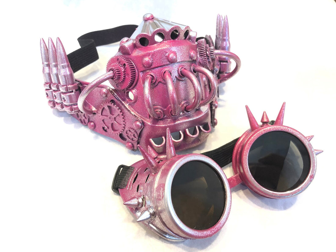 Steampunk respirator mouth guard with spike goggles in pink silver for sale.