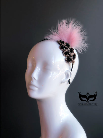 Pink feather fascinator hat with black beaded applique, elegant headpiece for weddings, races, and tea parties.