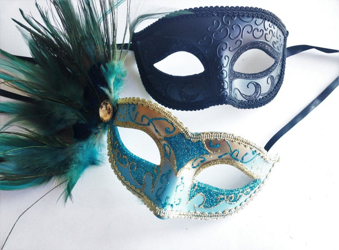 Elegant teal and gold feather couples masquerade masks with glitter, gemstone, and filigree design.