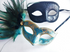 Elegant teal and gold feather couples masquerade masks with glitter, gemstone, and filigree design.