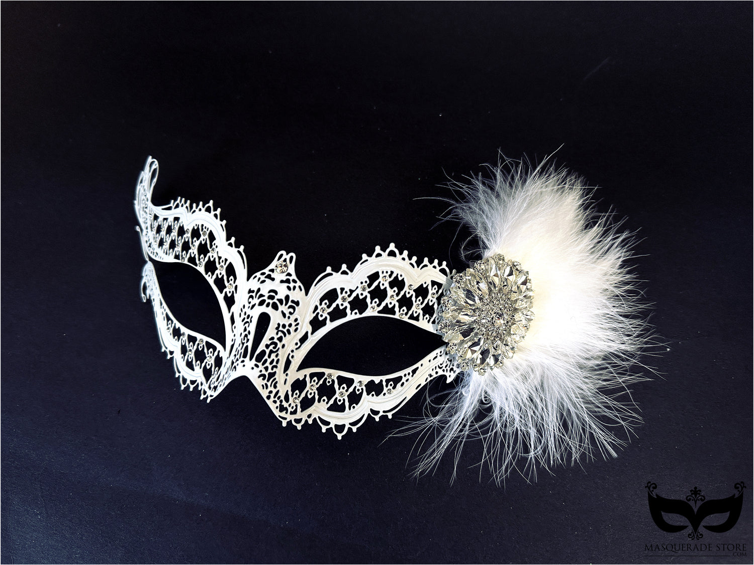 White metal masquerade mask with crystals and feather detailing for weddings and Venetian masquerade balls