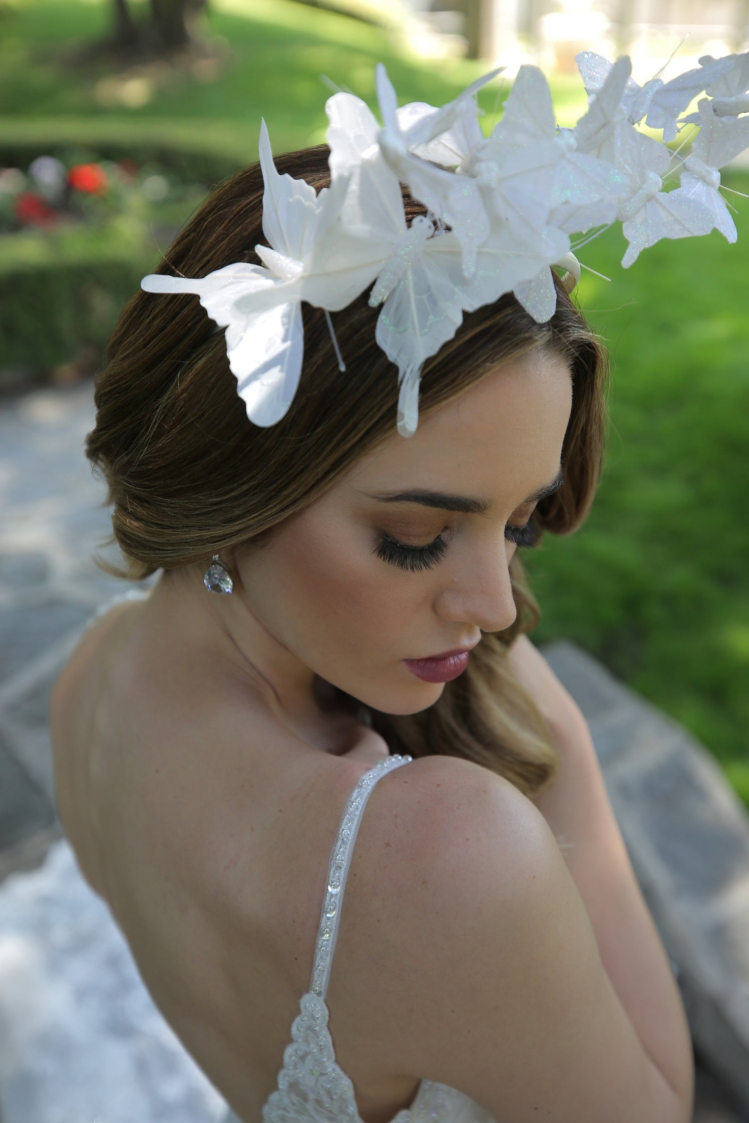 Elegant bridal headpiece with white butterflies, ideal for whimsical outdoor ceremonies