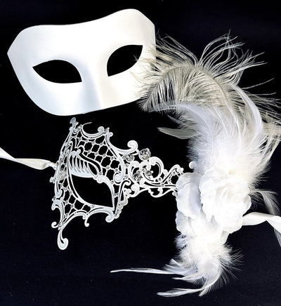 Elegant white Venetian couples masquerade masks featuring a simple satin mask for men and a lace mask with feathers and floral accents for women, perfect for weddings and formal events.
