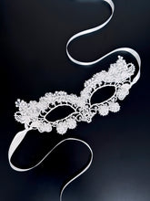 Elegant white lace masquerade mask with floral embroidery, perfect for weddings, proms, and masquerade balls.
