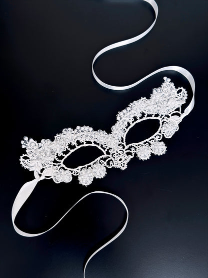 Elegant white lace masquerade mask with floral embroidery, perfect for weddings, proms, and masquerade balls.