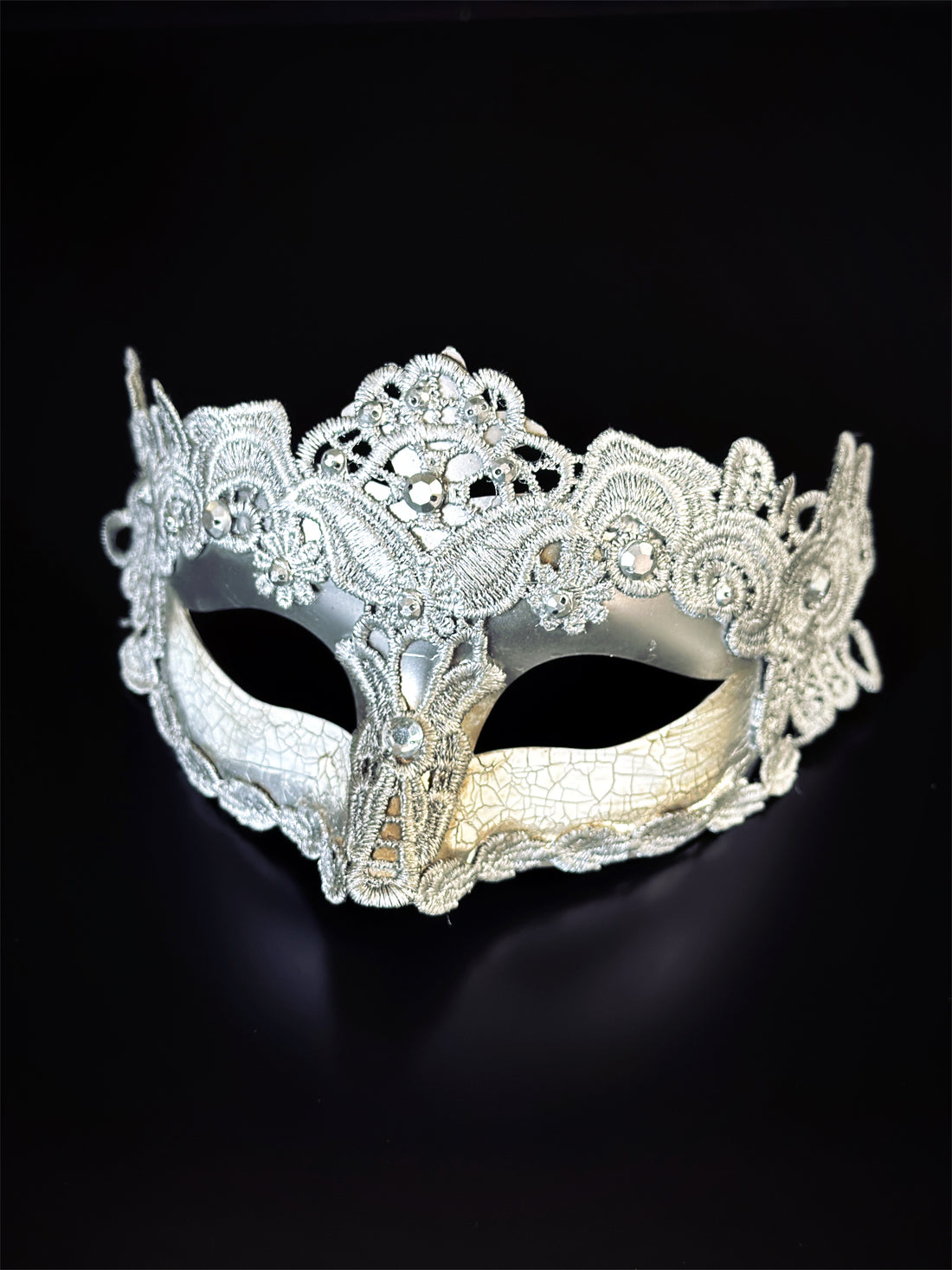 Elegant white masquerade mask with glittering stones and bridal-style lace