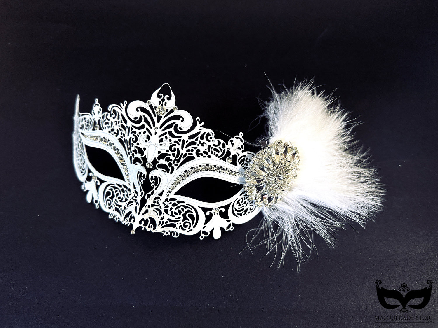 White metal masquerade mask with rhinestones and feather accent for weddings, masquerade balls, and Venetian parties