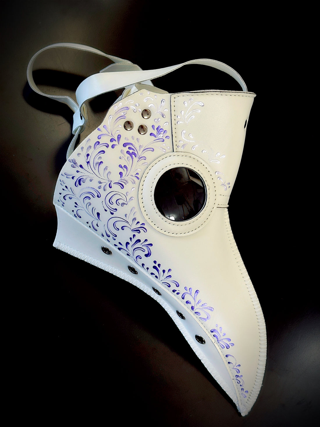White plague mask with purple filigree for sale.