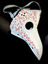 White plague mask with red filigree for sale.