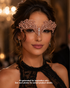 Blush bronze lace masquerade mask with ornate openwork embroidery, crystal rhinestone center accents, and satin ribbon ties for ballroom and formal events.