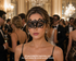 Noir Arabella black crystal masquerade mask with ornate filigree scrollwork, clear rhinestones, almond eye openings, and ribbon ties.