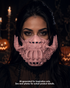 Pink steampunk respirator mask with mechanical half-face silhouette, curved tubes, gear details, vent openings, and pointed side accents.

