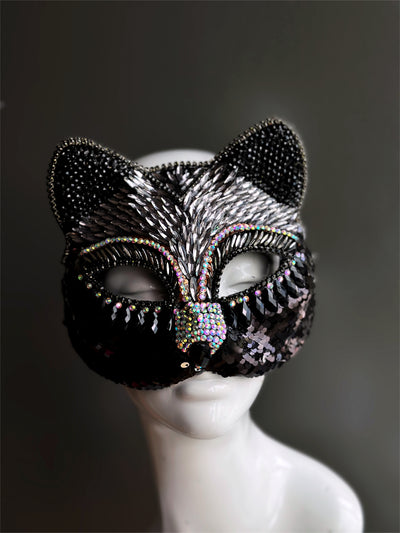Women's black cat masquerade mask covered in rhinestones.