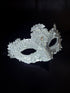 Womens masquerade mask in silver with gems.