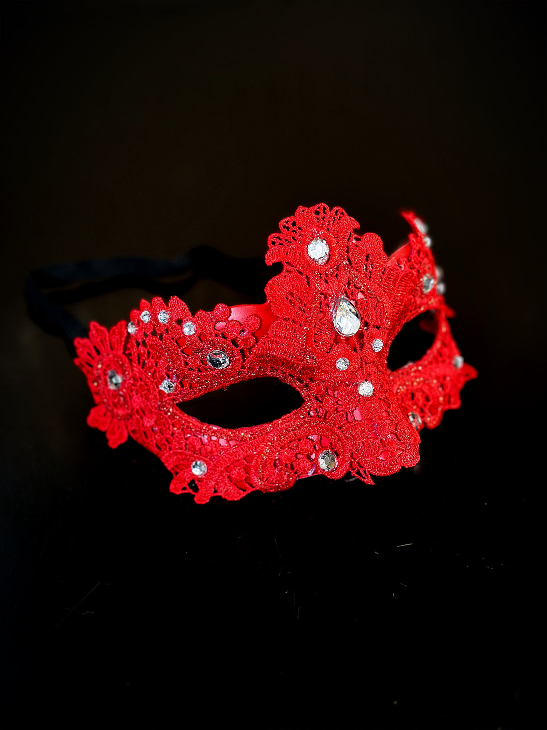 Womens lace brocade masquerade mask in red with clear gems.