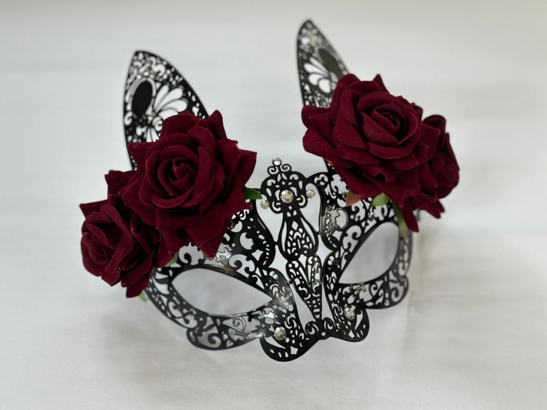 Womens metal bunny masquerade mask in black with rhinestones and red fabric roses.