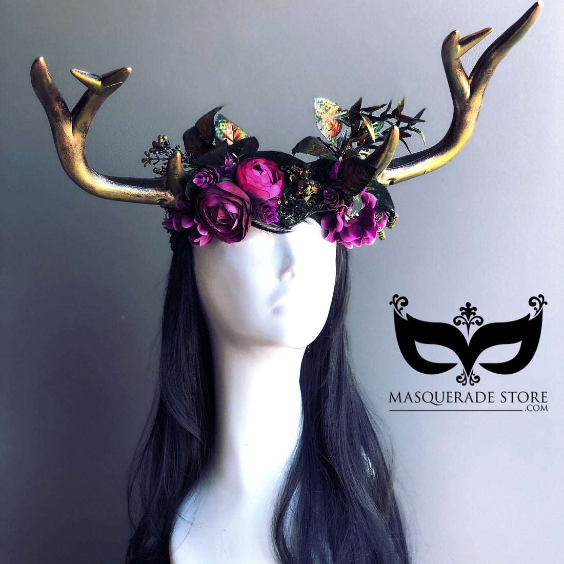 Blooming antler headdress inspired by the Celtic goddess Beltane, featuring golden antlers, florals, and butterflies for a nature-inspired look.