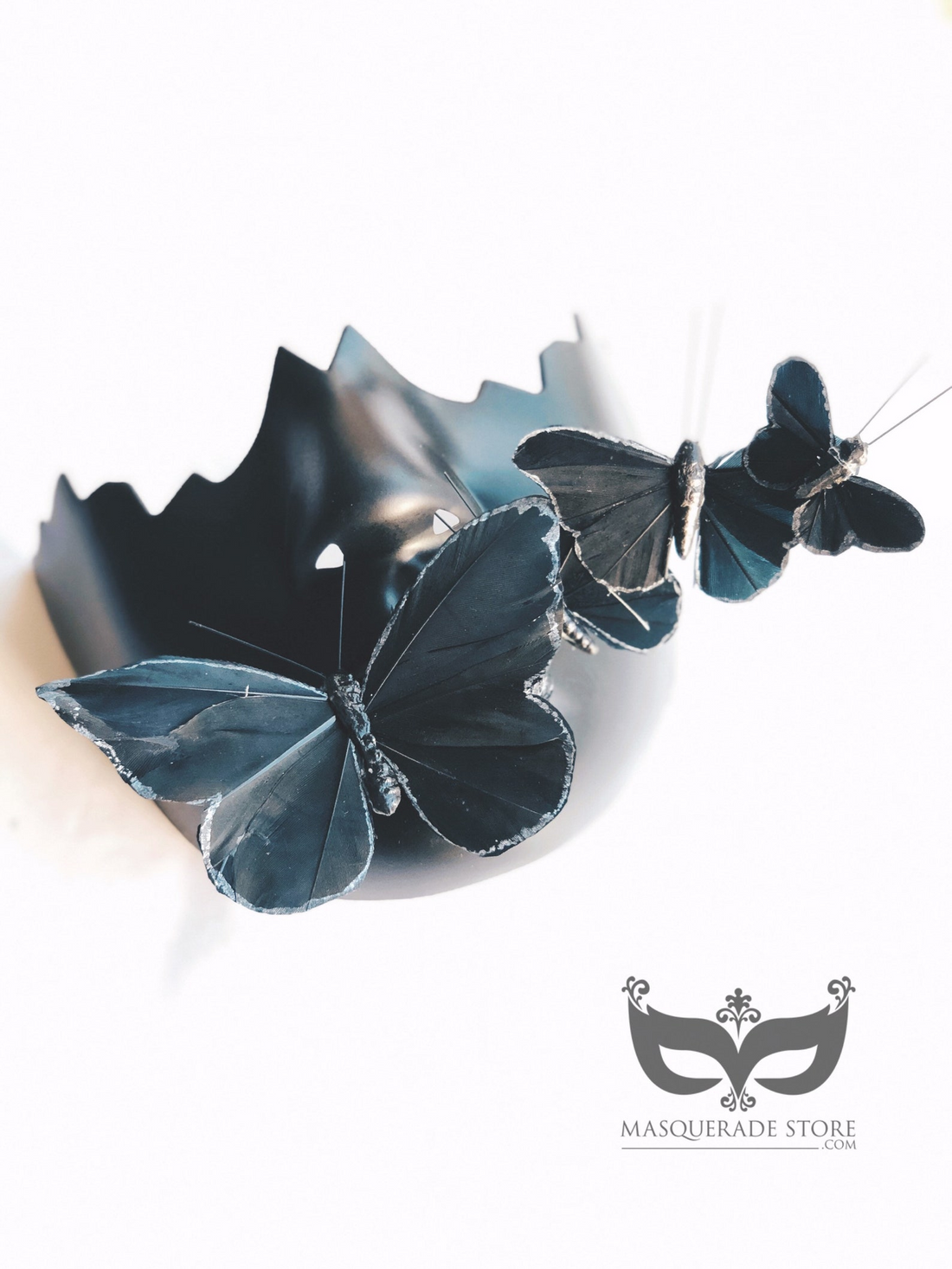 Black butterfly masquerade masks with 3D butterfly accents for men.