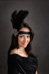 Black flapper headpiece with feather and beaded embellishment, perfect for 1920s Gatsby-themed parties or vintage events.