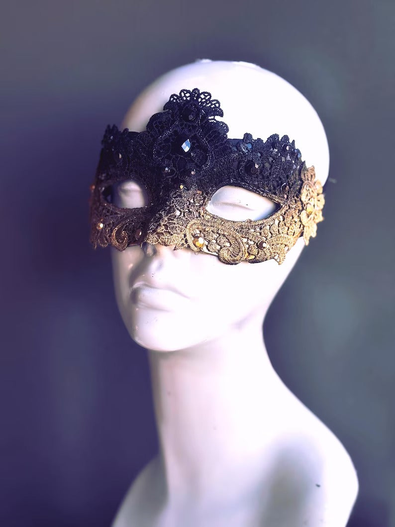 Elegant black and gold lace masquerade mask with rhinestones, Venetian-style accessory for women
