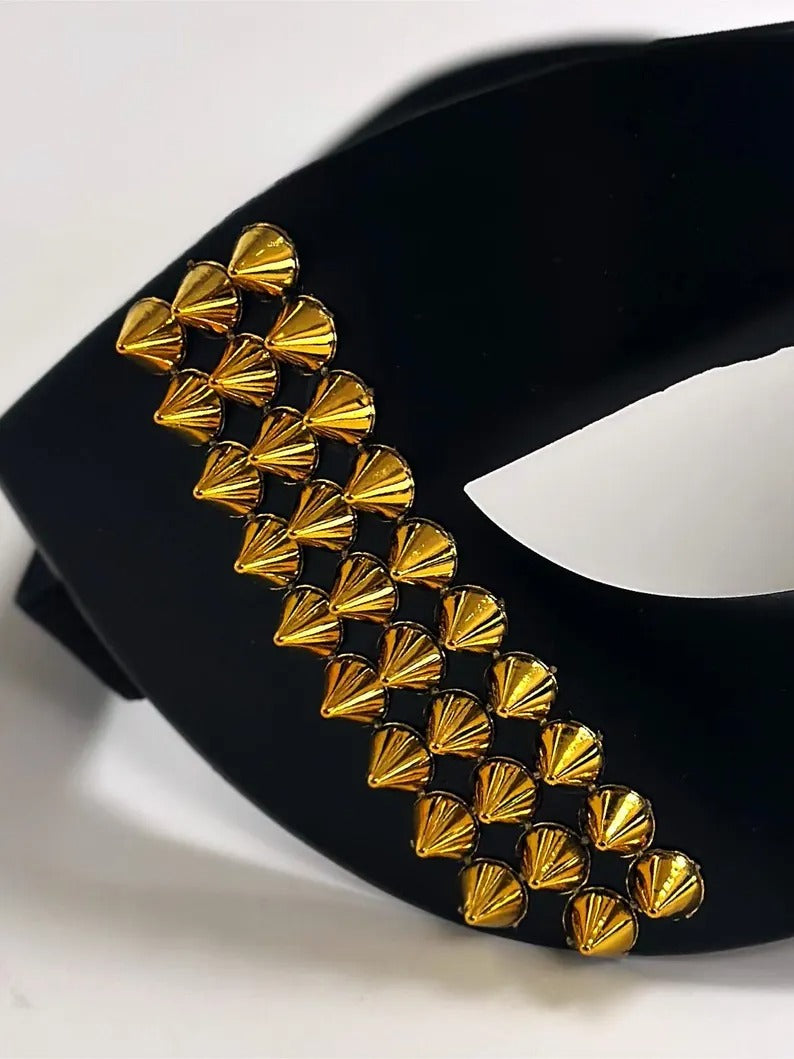 Black Venetian masquerade mask with bold gold stud accents, men’s edgy half-face party mask.